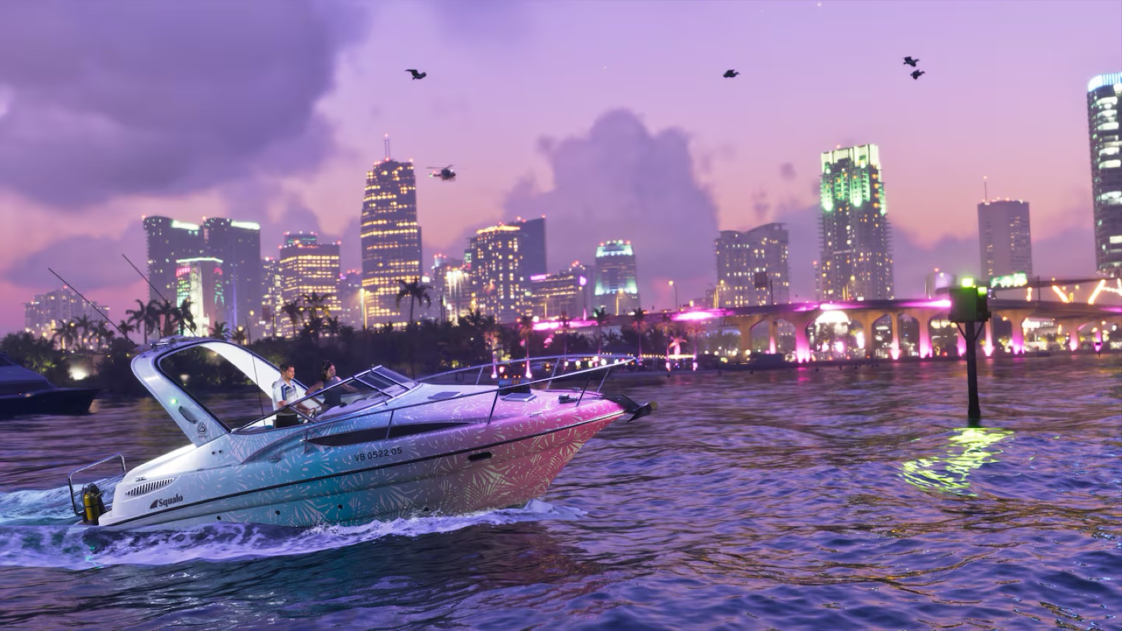 The Squalo speedboat on purple water with a tropical-print hull